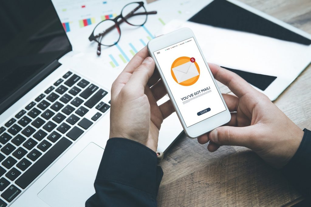Phishing email on smart phone as part of the best cyber security awareness training program for phishing.